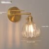 0355c1b7-c5cc-4ddf-b946-e9c23ac84fcd_trans.jpeg Retro Copper Glass Amber Little Flower Single-head Bedroom Simple Chandelier