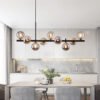 661458b0-e6c2-4edf-81dc-c228c9159c6a.jpg A Long Minimalist Glass Magic Bean Chandelier