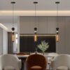 c58fba21-7e55-4176-862e-c59a052e3572.jpg Modern Black Wrought Iron Pendant Light For Kitchen Island
