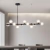 e1562ed9-bd78-4eba-929c-b70ee503ae28.jpg A Long Minimalist Glass Magic Bean Chandelier