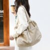 d5c9a4f7-866d-4677-a219-321b5bd116e6.jpg Ins Corduroy Shoulder Bags Drawstring Multi-pocket Handbag Women Underarm Bags
